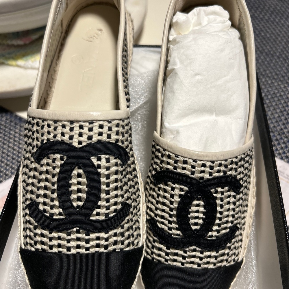CHANEL Black and Cream Flats with Iconic CC Logo